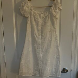 Elegant White Midi Dress with Floral Details